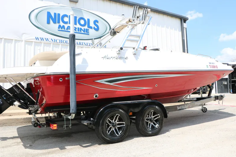 Slide: The Image of 2022 Hurricane SunDeck Sport 201 IO boat on trailer at Nichols Marine. - 1
