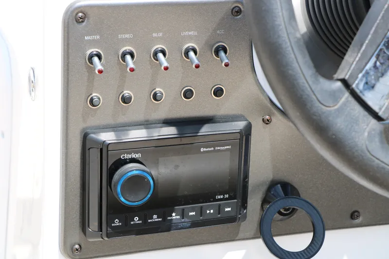 Slide: The Image of Control panel of 2022 Hurricane SunDeck Sport 201 IO with Clarion stereo system. - 36
