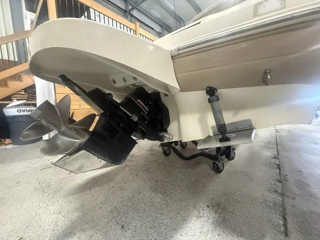 Slide: The Image of The image shows the drive of a 2001 Sea Ray 260 Signature boat in a storage facility. - 4