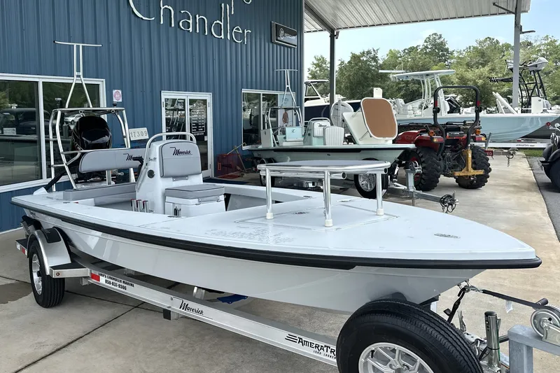 Slide: The Image of 2027 Maverick 18 HPX-V boat on trailer at dealership, showcasing sleek design and modern features. - 1