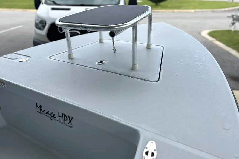 Slide: The Image of 2027 Maverick 18 HPX-V boat deck with elevated platform and sleek design. - 2