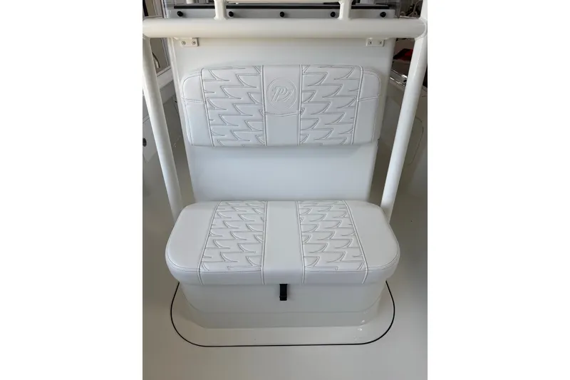 Slide: The Image of White cushioned seating on 2027 Parker 230 Coastal Elite boat, featuring stylish stitching design. - 20