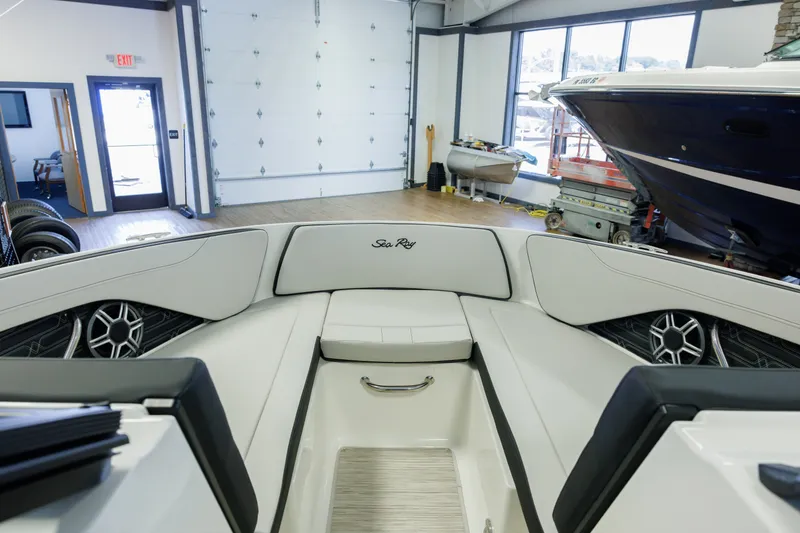 Slide: The Image of Interior of 2027 Sea Ray SPX 210 boat with white seating and modern design. - 13