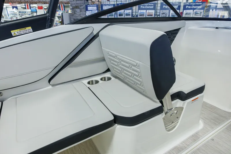 Slide: The Image of Interior seating of 2027 Sea Ray SPX 210 boat with modern design and cup holders. - 17