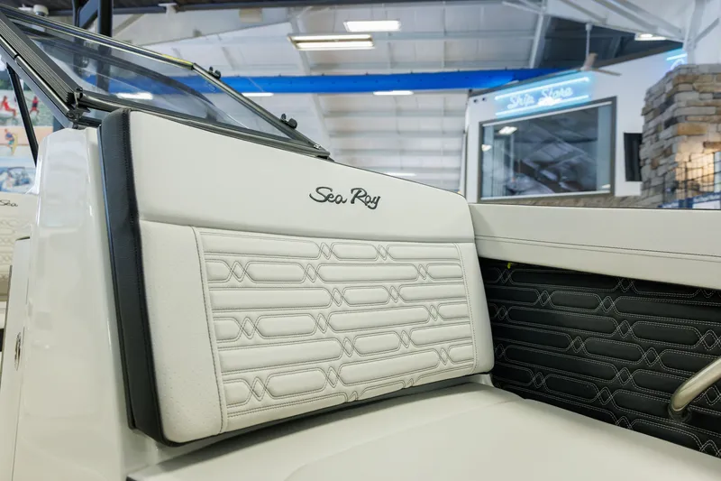 Slide: The Image of 2027 Sea Ray SPX 210 boat interior with stylish white and black seating. - 14