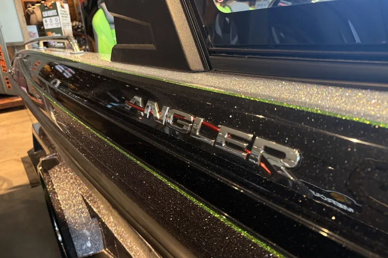The Image of 2026 Ranger 1880MS boat with sleek black finish and "Angler" logo detail. - 0