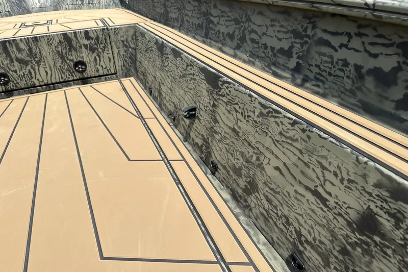 Slide: The Image of 2026 Tracker Grizzly 1650 T Prairie Wings Edition interior with camouflage design. - 18