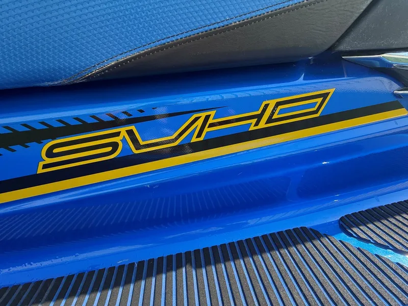 Slide: The Image of Close-up of a blue 2016 Yamaha WaveRunner FX Cruiser SVHO with yellow SVHO logo. - 6