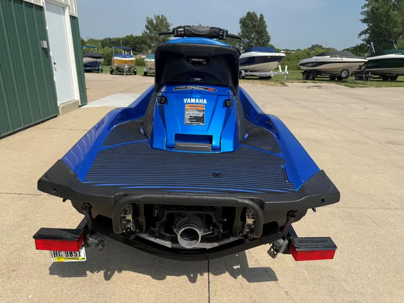 Slide: The Image of A blue 2016 Yamaha WaveRunner FX Cruiser SVHO on a trailer in a parking area. - 12
