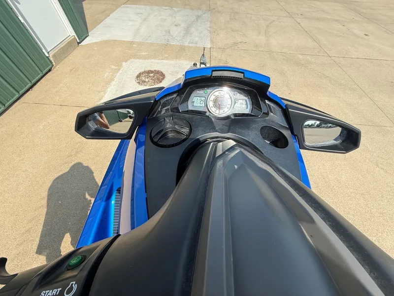 Slide: The Image of The image shows the cockpit of a blue 2016 Yamaha WaveRunner FX Cruiser SVHO. It features a digital display and mirrors. - 9