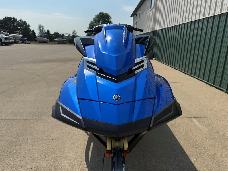 Slide: The Image of A blue 2016 Yamaha WaveRunner FX Cruiser SVHO on a trailer in a parking area. - 3