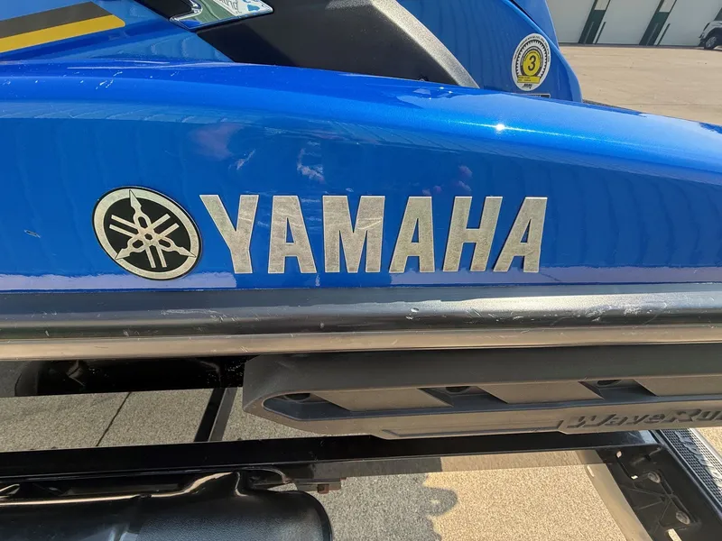 Slide: The Image of Close-up of a blue Yamaha WaveRunner with logo and lettering on the side. - 5