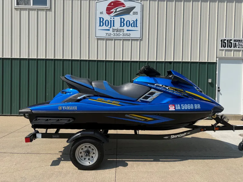 The Image of A blue 2016 Yamaha WaveRunner FX Cruiser SVHO on a trailer in front of a building. - 0