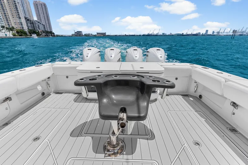Slide: The Image of 2020 HCB 53 Suenos boat deck with ocean view and city skyline. - 52