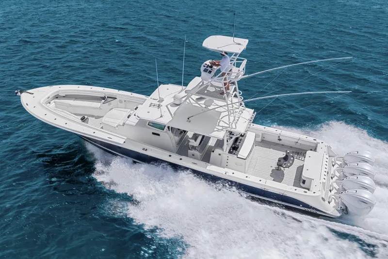 Slide: The Image of 2020 HCB 53 Suenos boat cruising on open blue water. - 20