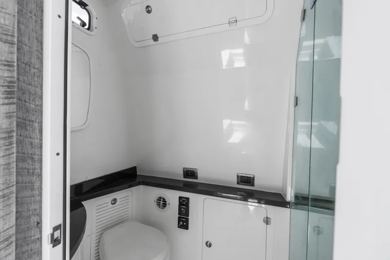 Slide: The Image of 2020 HCB 53 Suenos boat interior bathroom with modern fixtures and sleek design. - 62