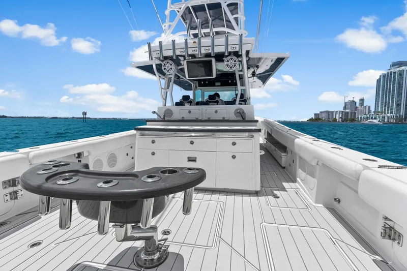 Slide: The Image of 2020 HCB 53 Suenos luxury boat deck with ocean and city skyline view. - 46