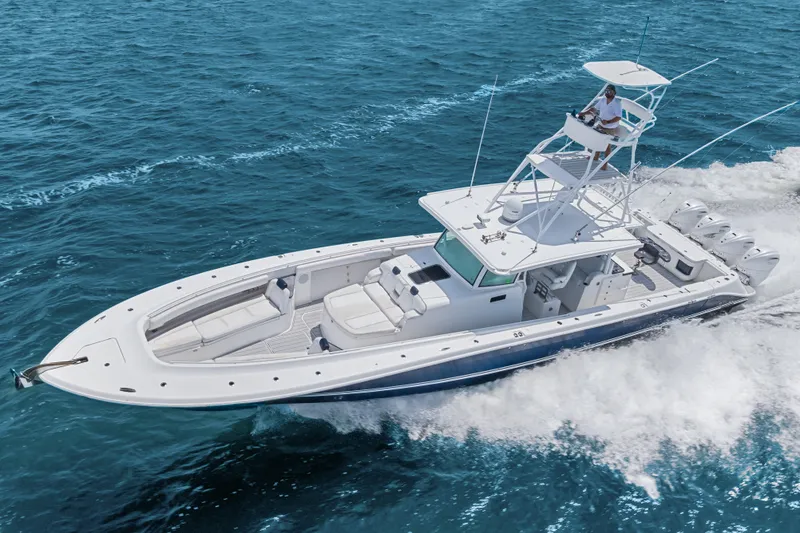 Slide: The Image of 2020 HCB 53 Suenos boat cruising on open ocean waters. - 22