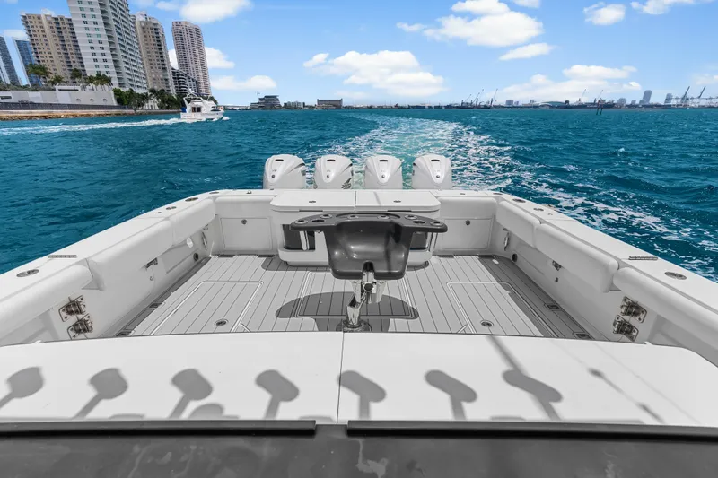 Slide: The Image of 2020 HCB 53 Suenos boat cruising near city skyline on a sunny day. - 57
