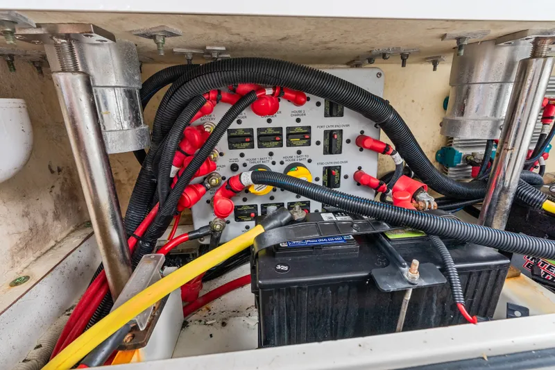 Slide: The Image of Electrical wiring and battery setup in a 2020 HCB 53 Suenos boat. - 75