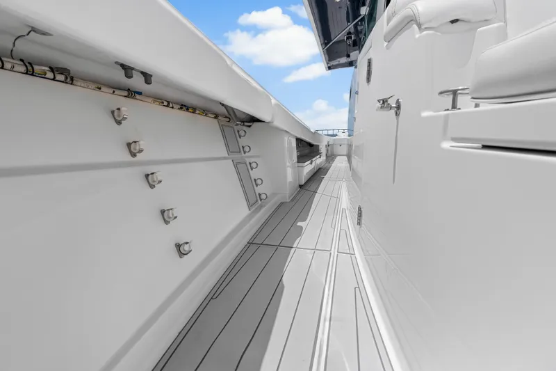Slide: The Image of 2020 HCB 53 Suenos yacht deck with sleek white finish and modern design. - 49