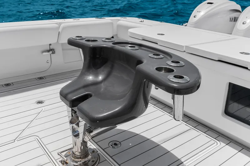 Slide: The Image of Fishing chair on 2020 HCB 53 Suenos boat deck with ocean backdrop. - 50