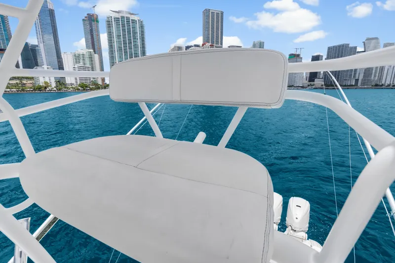 Slide: The Image of Luxury HCB 53 Suenos boat seat with city skyline in background, 2020 model. - 72