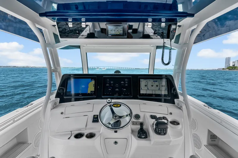 Slide: The Image of Cockpit view of 2020 HCB 53 Suenos boat with advanced navigation displays. - 40