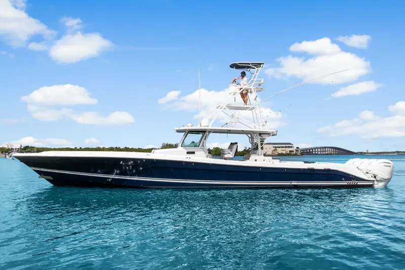 The Image of 2020 HCB 53 Suenos boat on clear blue water under a bright sky. - 0