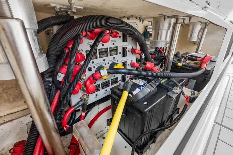 Slide: The Image of Electrical system of a 2020 HCB 53 Suenos boat, featuring batteries and wiring. - 73