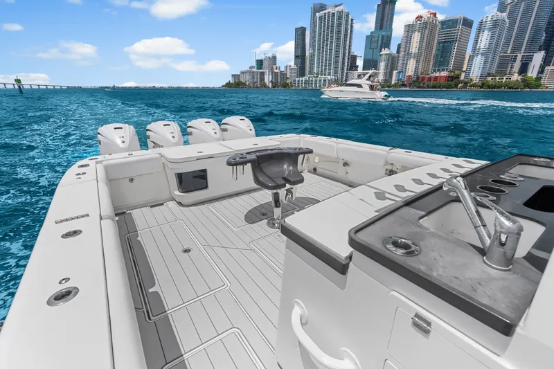 Slide: The Image of 2020 HCB 53 Suenos boat deck with city skyline and ocean view. - 45