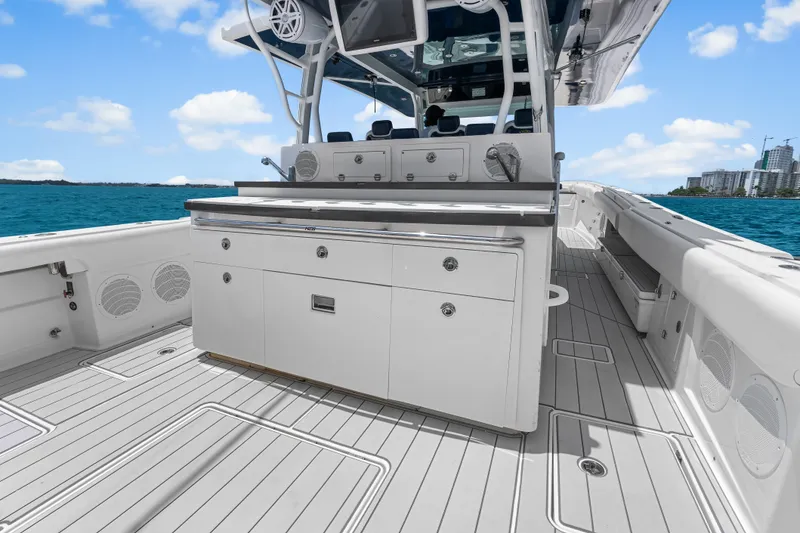 Slide: The Image of 2020 HCB 53 Suenos boat deck with sleek cabinetry and ocean view. - 47