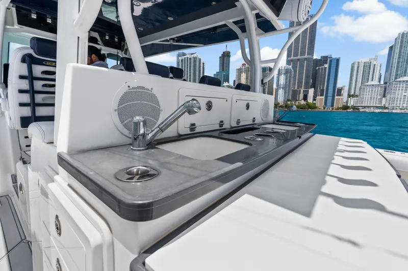 Slide: The Image of 2020 HCB 53 Suenos yacht interior with sink, city skyline in background. - 48