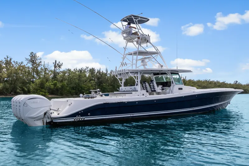 Slide: The Image of 2020 HCB 53 Suenos boat on calm water, clear sky background. - 5