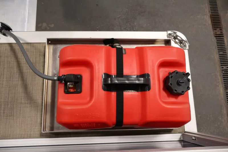 Slide: The Image of Red fuel tank on 2024 Sun Tracker Bass Buggy 16 XL boat. - 29
