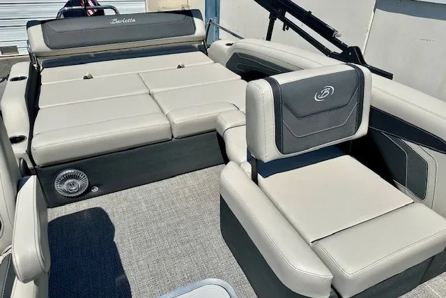 Slide: The Image of 2026 Barletta Cabrio 24U boat interior with luxurious seating and modern design. - 11