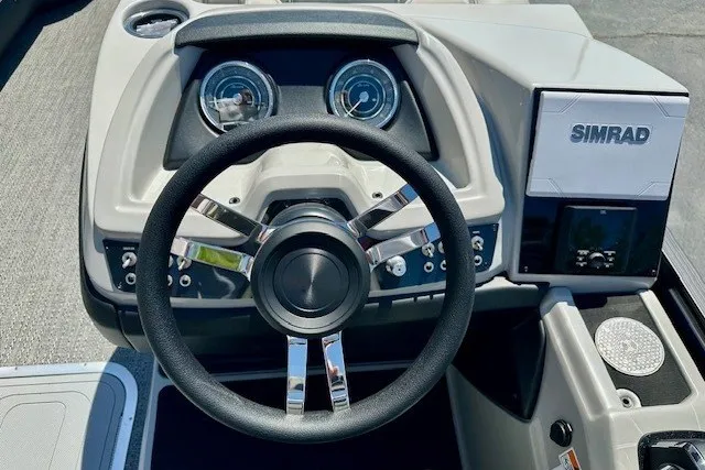 Slide: The Image of Steering console of 2026 Barletta Cabrio 24U with Simrad display and gauges. - 8