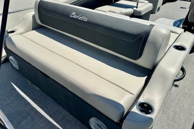 Slide: The Image of 2026 Barletta Cabrio 24U boat seating with cup holders and stylish upholstery. - 12