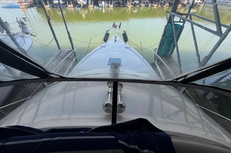 Slide: The Image of 1998 Silverton 352 Motor Yacht docked at marina, viewed from cockpit. - 8