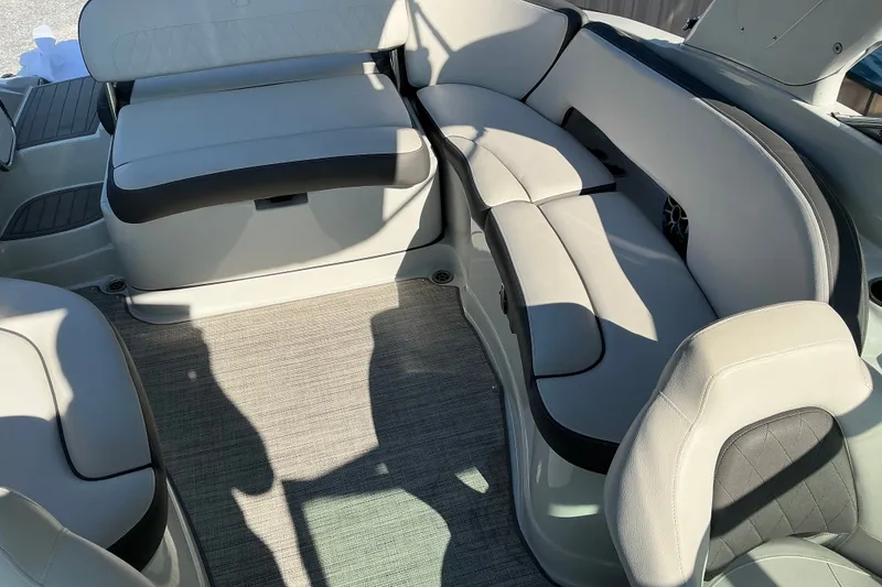 Slide: The Image of 2022 Crownline 290 SS boat interior with luxurious seating and modern design. - 18