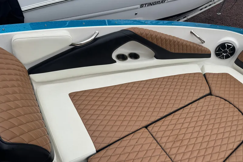 Slide: The Image of Luxurious interior of 2021 Checkmate Pulsare 2400 BRX boat with diamond-stitched seating. - 23