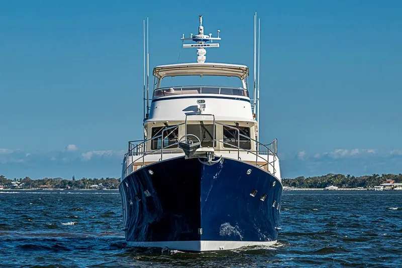 Slide: The Image of 2017 Kadey-Krogen 58EB yacht on open water, front view. - 3