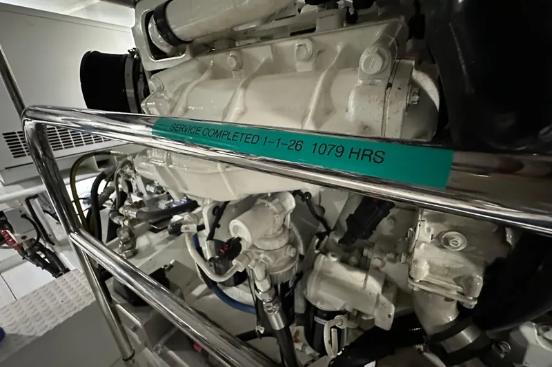 Slide: The Image of Engine room of 2017 Kadey-Krogen 58EB yacht, showing service details and components. - 93