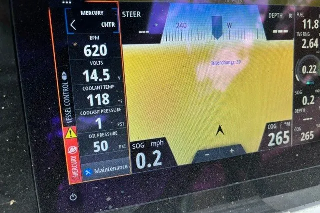 Slide: The Image of Dashboard display of a 2023 Sea Ray SPX 210 boat showing navigation and engine data. - 11