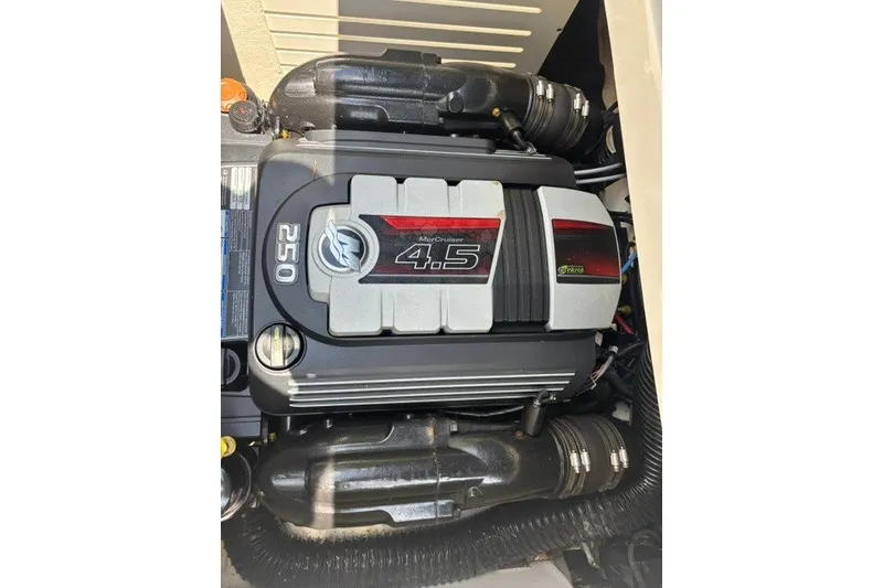 Slide: The Image of 2023 Sea Ray SPX 210 MerCruiser 4.5 engine, showcasing 250 horsepower. - 10