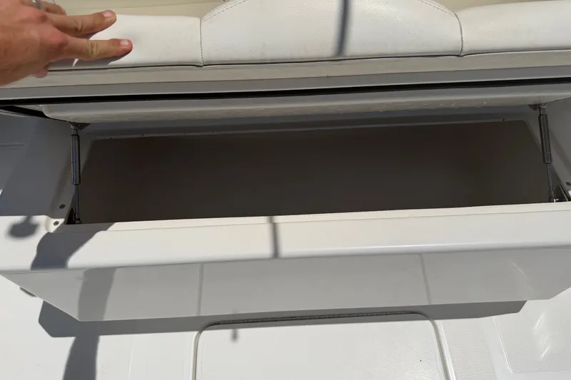 Slide: The Image of Open storage compartment on a 2019 Invincible 36 Open Fisherman boat. - 34