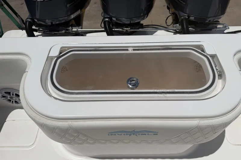 Slide: The Image of 2019 Invincible 36 Open Fisherman livewell with triple outboard motors. - 40
