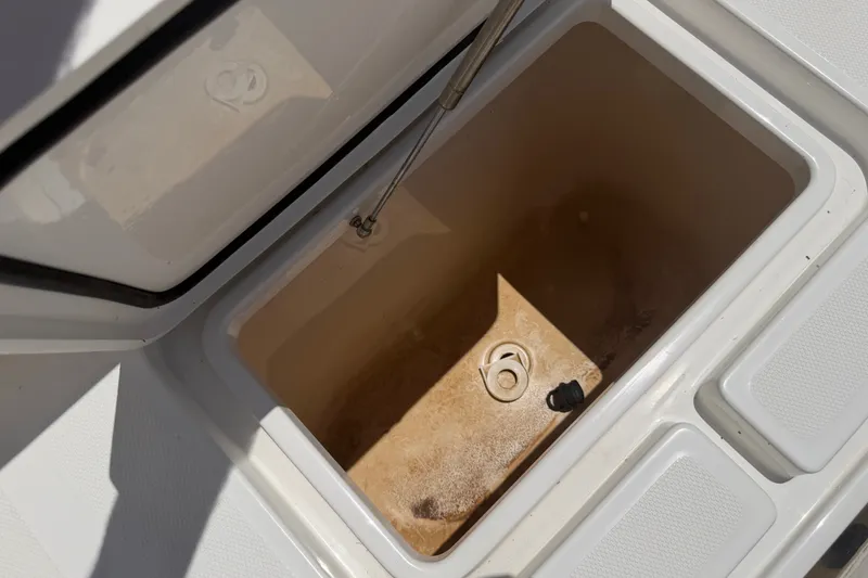 Slide: The Image of Open storage compartment on 2019 Invincible 36 Open Fisherman boat. - 41