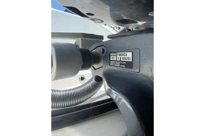 Slide: The Image of Close-up of Yamaha F300XCA engine part on 2019 Invincible 36 Open Fisherman boat. - 67
