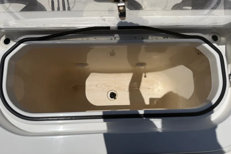 Slide: The Image of Open storage compartment on a 2019 Invincible 36 Open Fisherman boat. - 45
